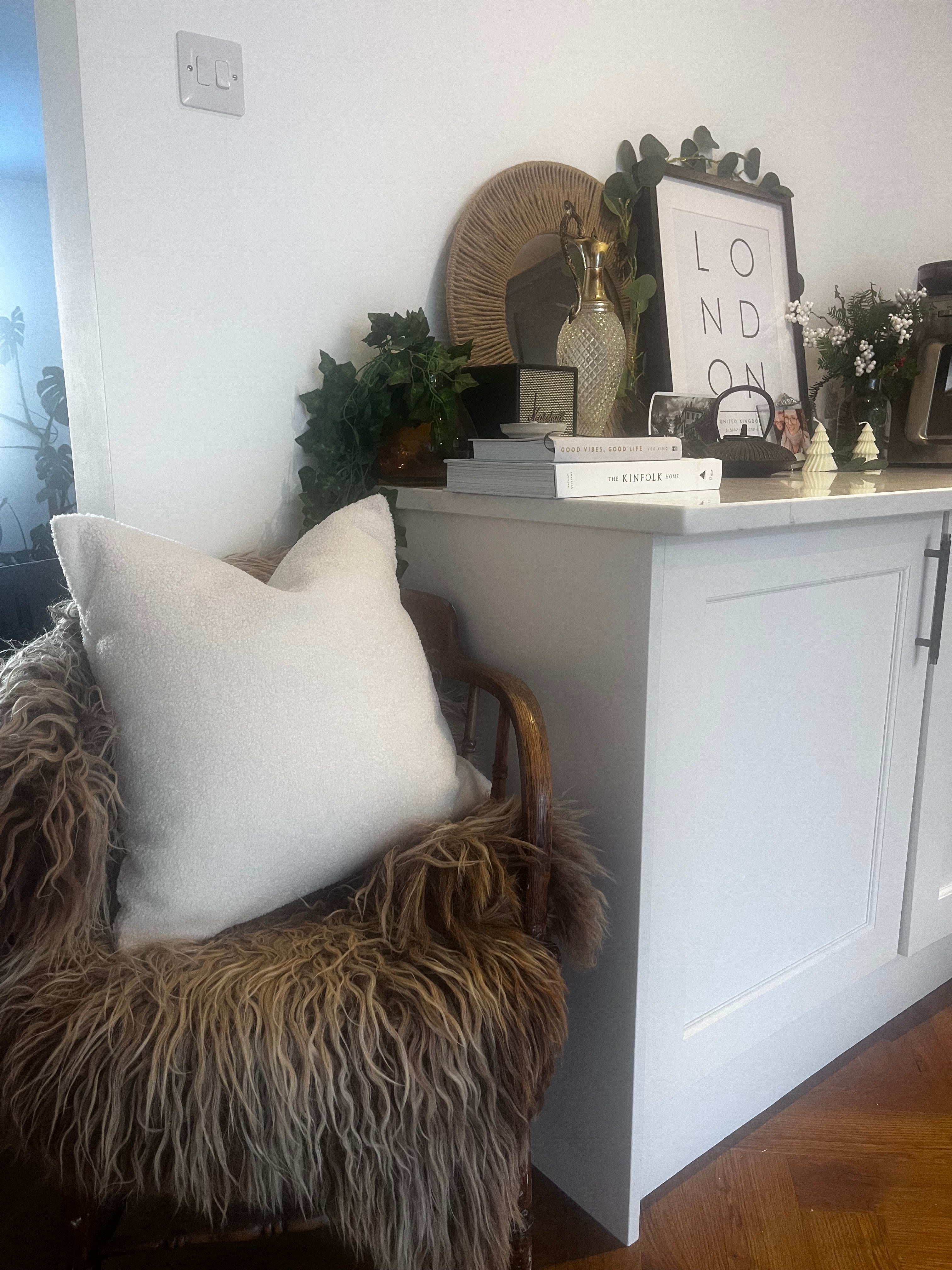 neutral cushions displayed on garden furniture