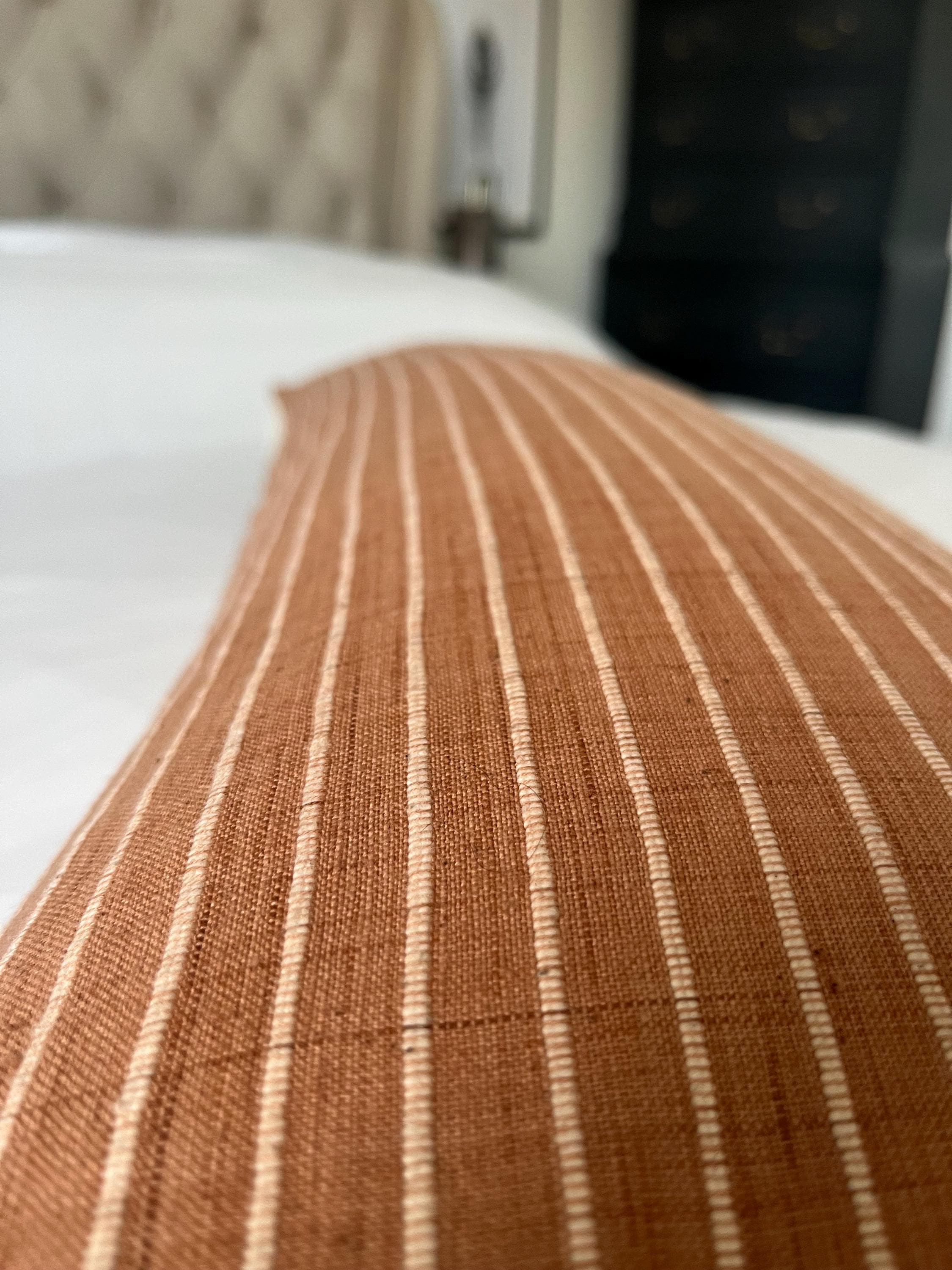 Long Terracotta bolster pillow cover: with an organic cotton envelope reverse