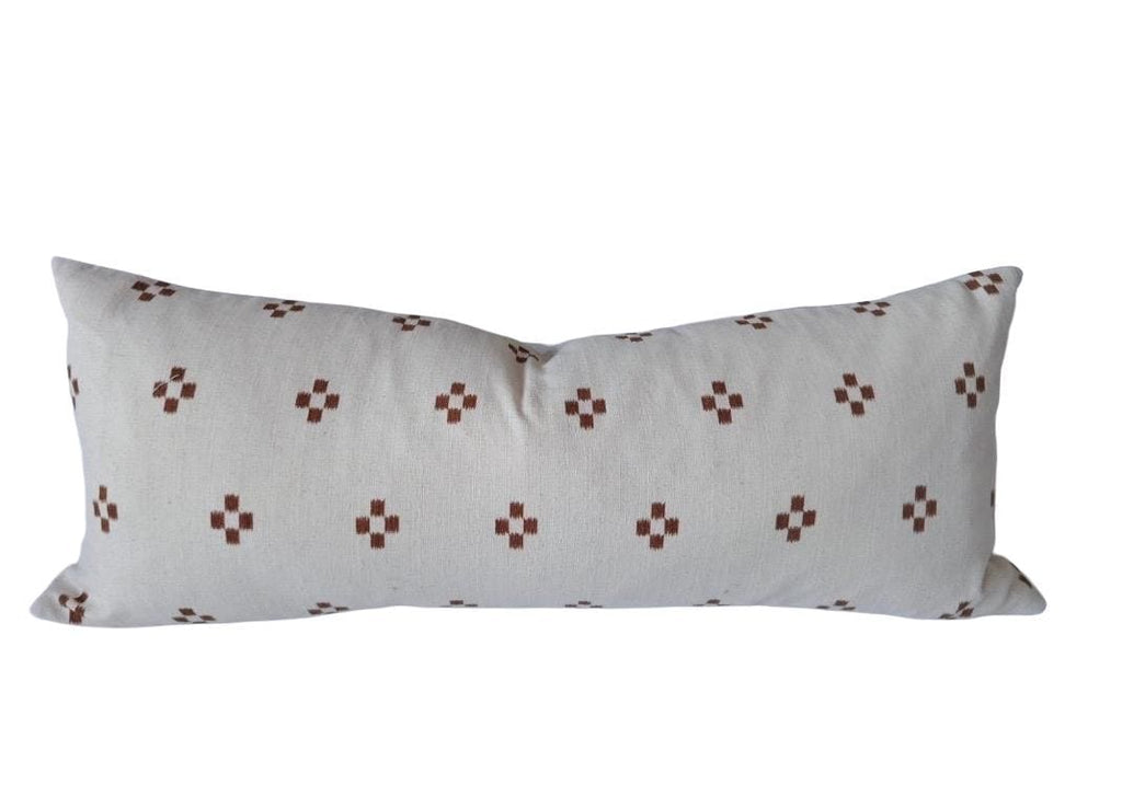 extra long rust patterened lumbar pillow cover, with buttoned reverse