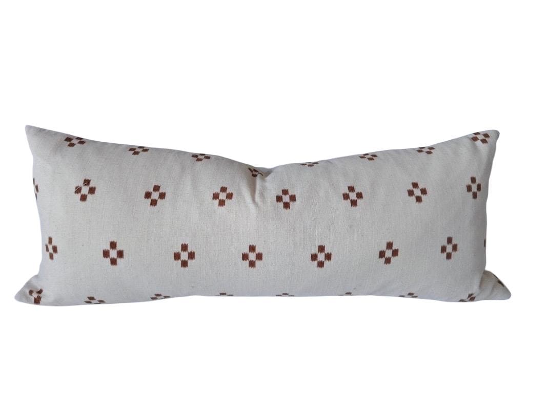 extra long rust patterened lumbar pillow cover, with buttoned reverse
