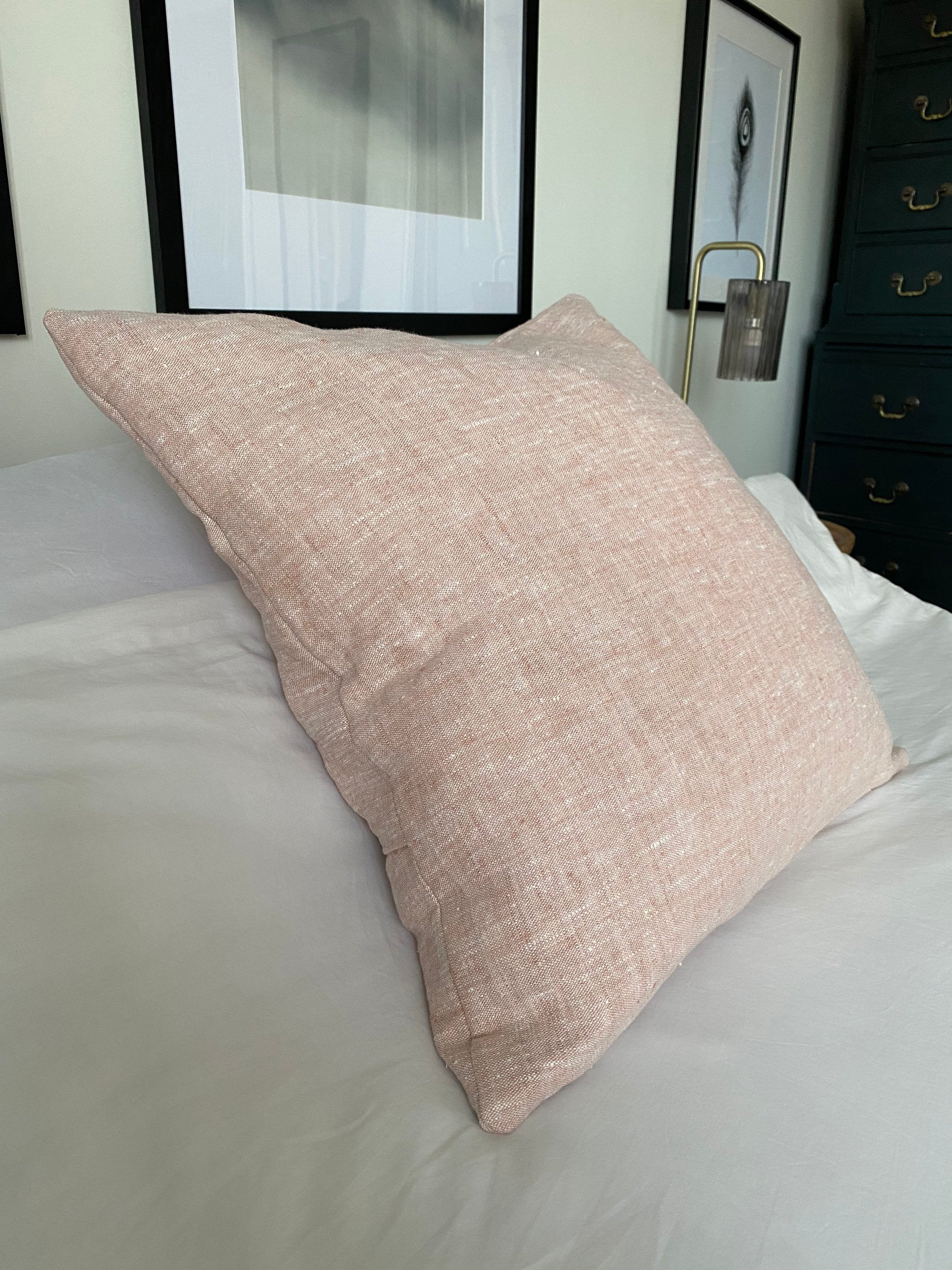 Blush pink textured linen cushion covers, with an envelope reverse
