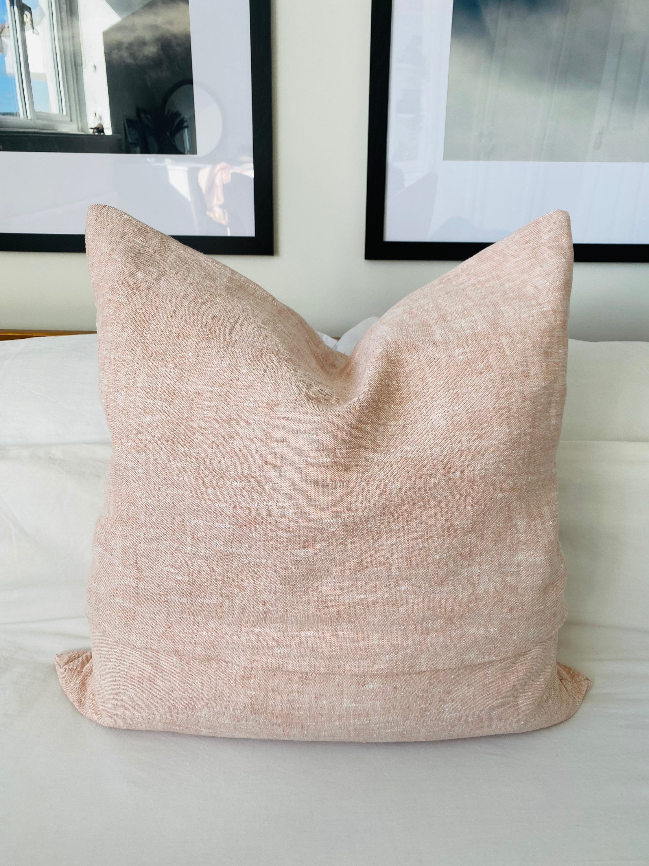 Blush pink textured linen cushion covers, with an envelope reverse