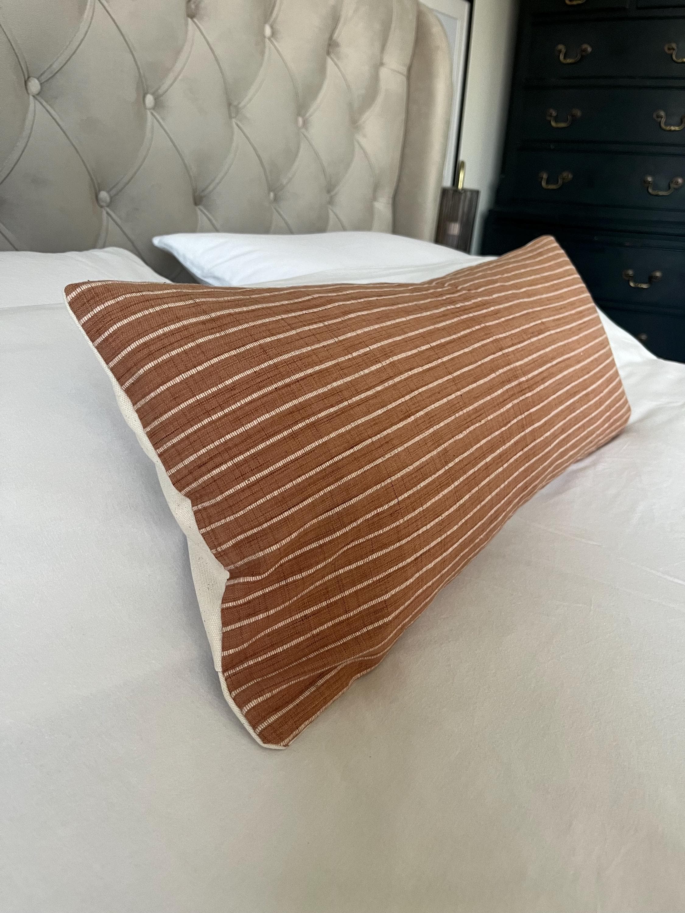 Long Terracotta bolster pillow cover: with an organic cotton envelope reverse