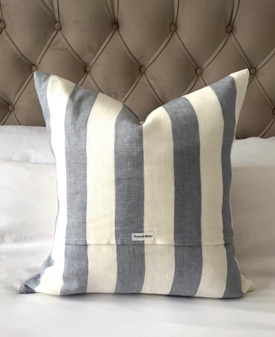 Wide stripe pillow cover with coastal design, envelope reverse side
